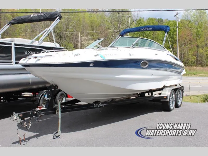Slide: The Image of 2005 Crownline 240EX boat on trailer at Young Harris Watersports & RV dealership. - 1