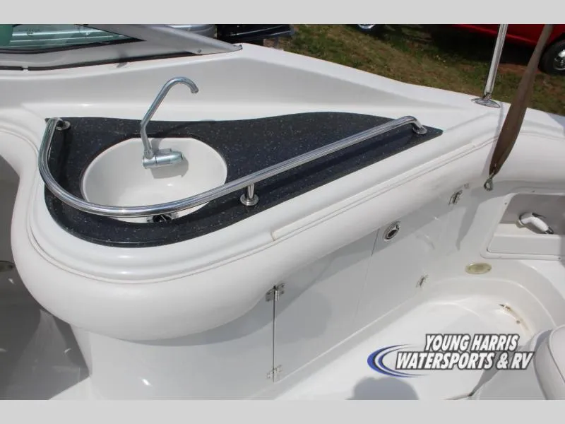 Slide: The Image of 2005 Crownline 240EX boat interior with sink and countertop detail. - 14