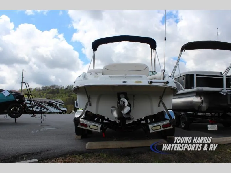 Slide: The Image of 2005 Crownline 240EX boat on trailer at Young Harris Watersports & RV dealership. - 4