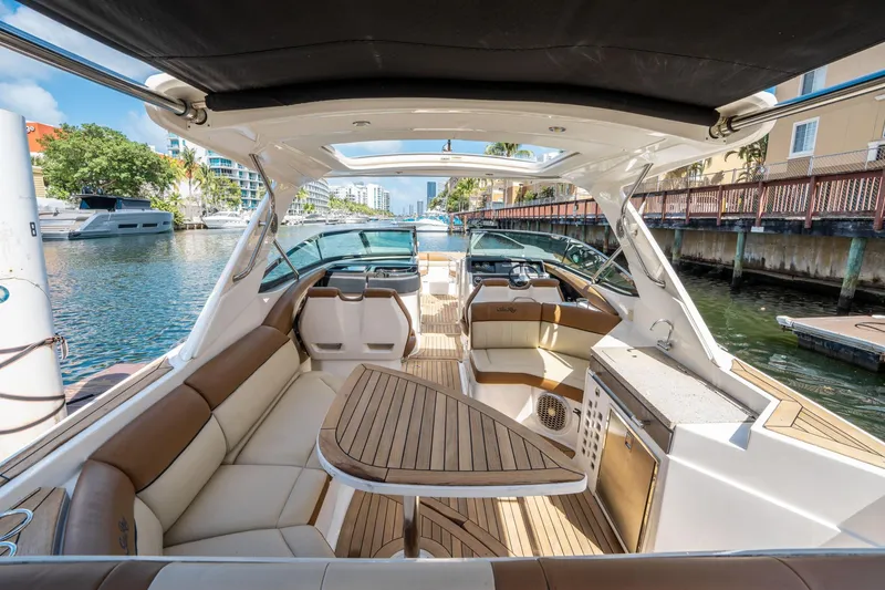 Slide: The Image of Luxurious 2015 Sea Ray 350 SLX boat interior with elegant seating and modern amenities. - 14