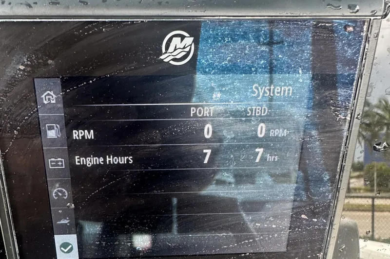 Slide: The Image of Display screen of a 2023 Blackfin 302CC showing engine hours and RPM. - 12