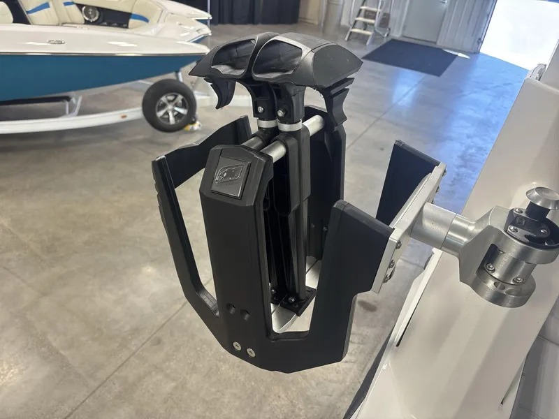 Slide: The Image of 2022 Nautique G25 Paragon boat accessory in a showroom setting. - 18
