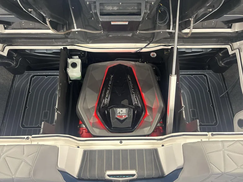 Slide: The Image of 2022 Nautique G25 Paragon engine compartment with PCM engine, detailed view. - 19