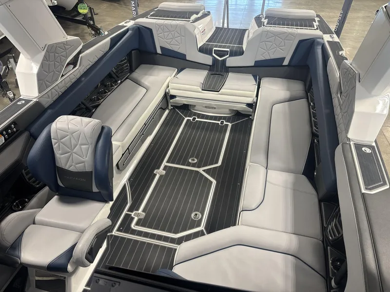 Slide: The Image of 2022 Nautique G25 Paragon interior with luxurious seating and modern design. - 7