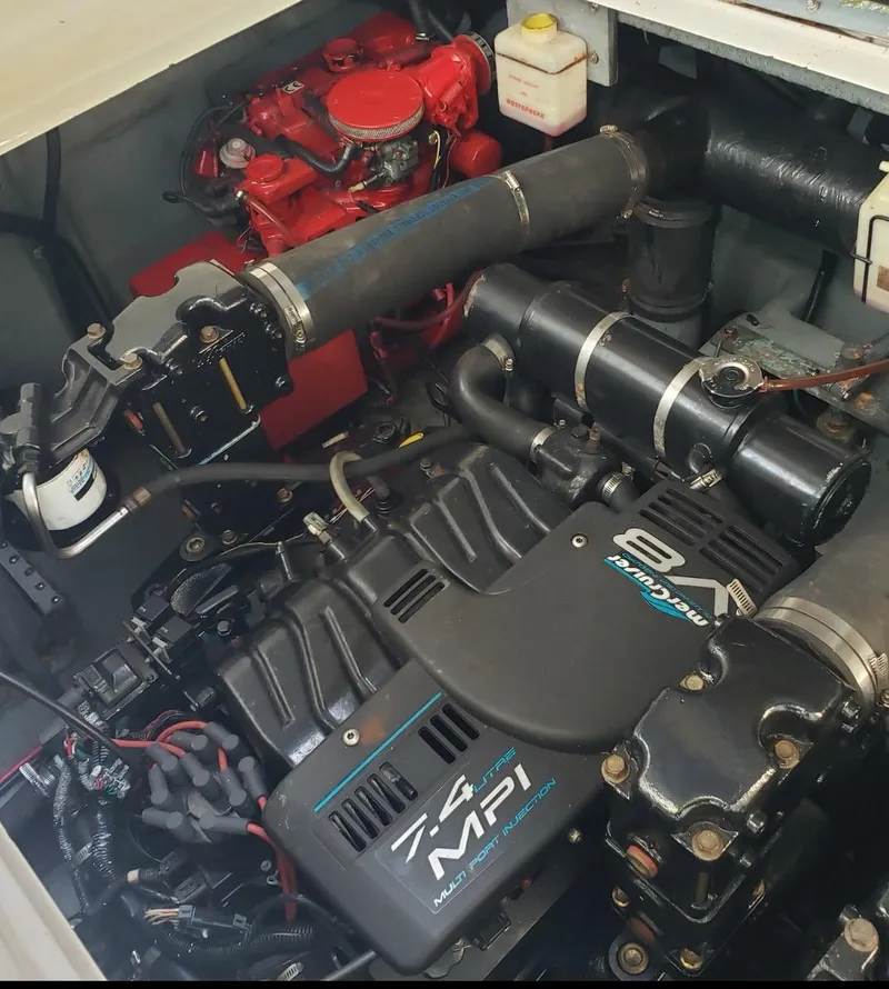 Slide: The Image of Engine compartment of a 1999 Sea Ray 330 Sundancer with 7.4 MPI V8 engine. - 17