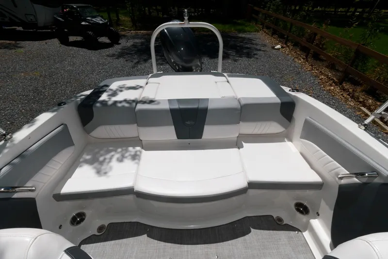 Slide: The Image of 2020 Chaparral 19 SSi OB boat interior with spacious seating and modern design. - 10