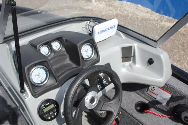 Slide: The Image of 2019 Tracker Pro Guide V-165 WT boat dashboard with steering wheel and Lowrance device. - 18