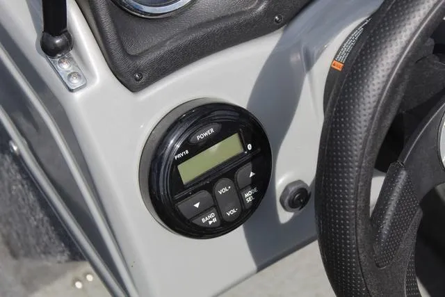 Slide: The Image of Control panel of 2019 Tracker Pro Guide™ V-165 WT boat, featuring power and volume buttons. - 19
