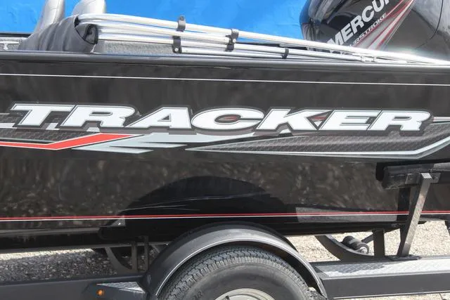 Slide: The Image of 2019 Tracker Pro Guide™ V-165 WT boat with bold logo on trailer. - 8