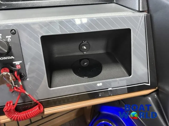 Slide: The Image of Control panel of 2025 Tahoe Cascade 2385 Tritoon with Honda ignition and emergency switch. - 17