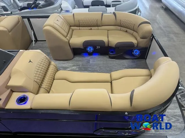Slide: The Image of 2025 Tahoe Cascade 2385 Swingback Tritoon with luxurious seating and ambient lighting. - 3