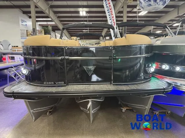 Slide: The Image of 2025 Tahoe Cascade 2385 VRB Tritoon displayed indoors at Boat World showroom. - 36