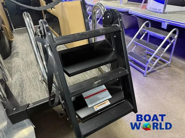 Slide: The Image of Tahoe Cascade 2385 Tritoon boat ladder at Boat World showroom, 2025 model. - 43