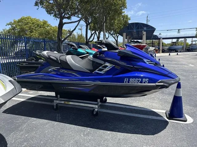 Slide: The Image of 2014 Yamaha WaveRunner FX HO, blue jet ski, side view. - 1