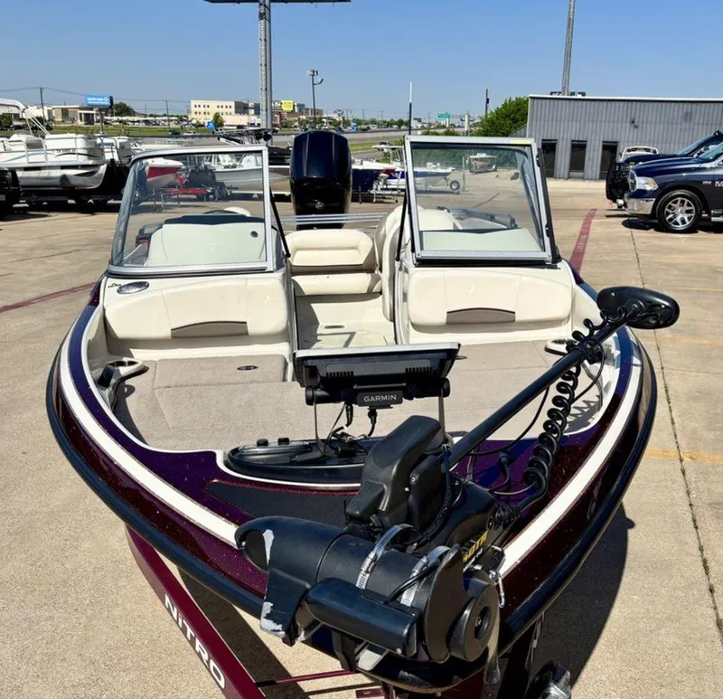 Slide: The Image of 2015 Nitro Sport Boats Z-7 Sport with Garmin equipment, parked in a marina. - 5