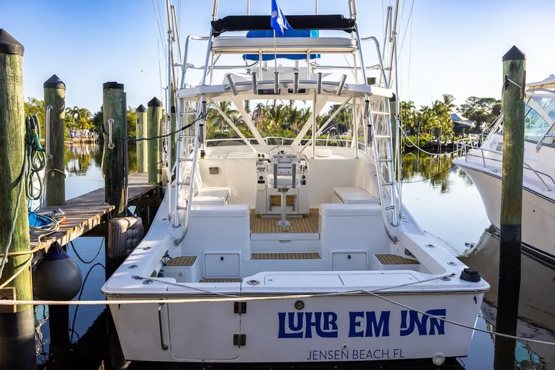 Slide: The Image of 1997 Luhrs Tournament 320 Open boat docked at Jensen Beach, Florida. - 12