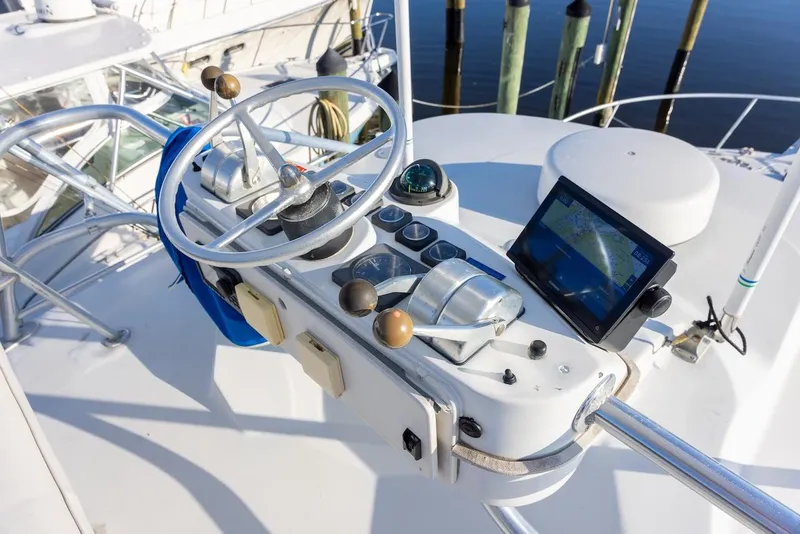 Slide: The Image of Helm of 1997 Luhrs Tournament 320 Open boat with navigation equipment. - 26