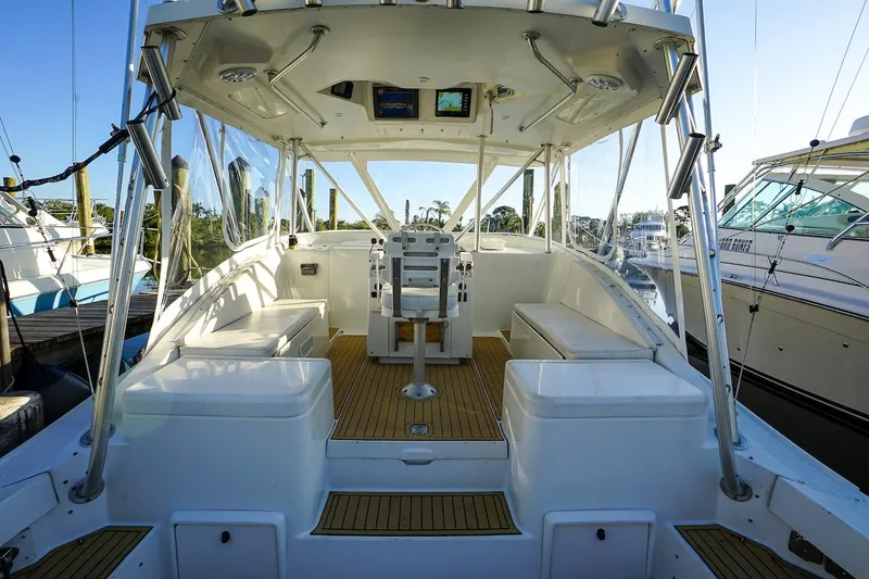 Slide: The Image of 1997 Luhrs Tournament 320 Open boat interior with seating and helm station. - 31