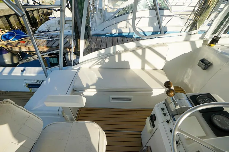 Slide: The Image of 1997 Luhrs Tournament 320 Open boat interior with seating and control panel. - 37
