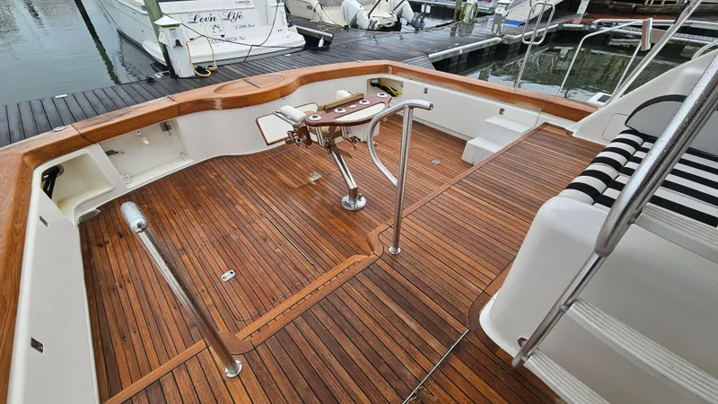 Slide: The Image of Ocean Yachts 2000 model 70 Super Sport with teak deck and fishing chair. - 13