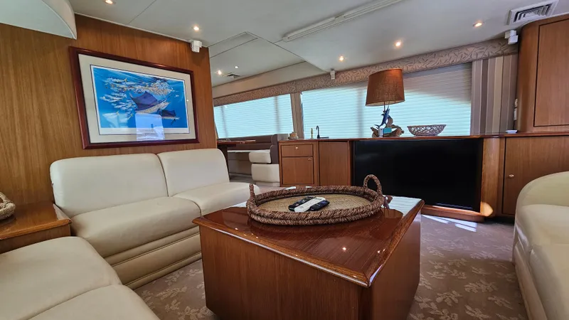 Slide: The Image of Luxurious interior of 2000 Ocean Yachts 70 Super Sport with elegant seating and decor. - 25