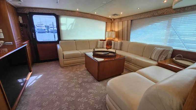 Slide: The Image of Luxurious interior of 2000 Ocean Yachts 70 Super Sport with elegant seating and decor. - 27