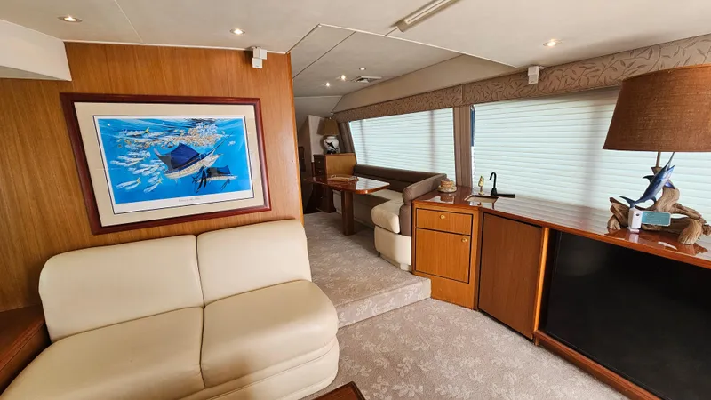 Slide: The Image of Luxurious interior of a 2000 Ocean Yachts 70 Super Sport with elegant furnishings. - 29