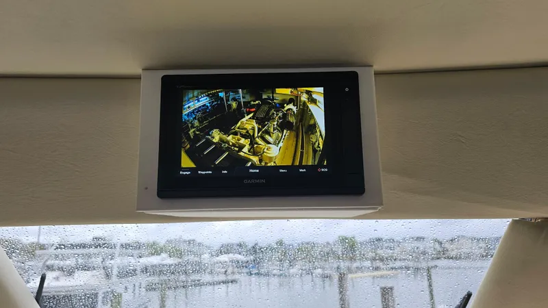 Slide: The Image of Display screen on 2000 Ocean Yachts 70 Super Sport, showing engine room view. - 49