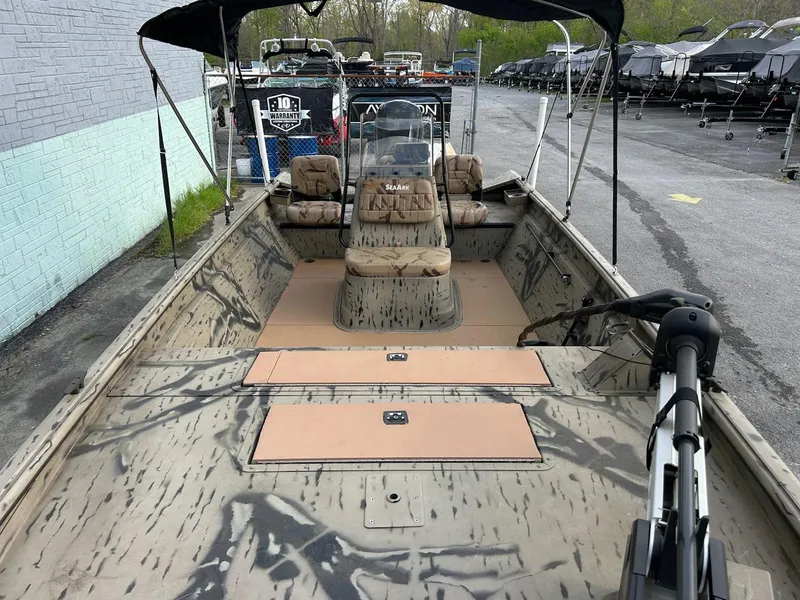 Slide: The Image of 2018 SeaArk 2072 RIVERCAT 200 CC boat with camouflage interior and canopy. - 9