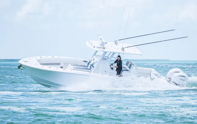 Slide: The Image of 2024 Invincible 33 Open Fisherman boat cruising on the ocean. - 20