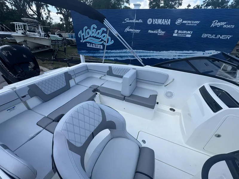 Slide: The Image of 2025 Bayliner VR4 Bowrider OB with spacious seating and modern design at Holiday Marine. - 4