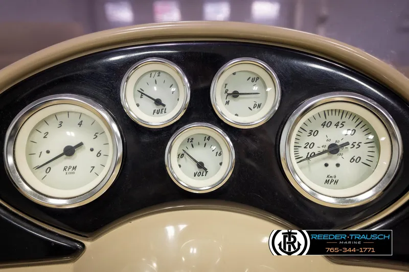 Slide: The Image of Dashboard of a 2016 Lowe SS230 boat with RPM, fuel, volt, and speed gauges. - 29