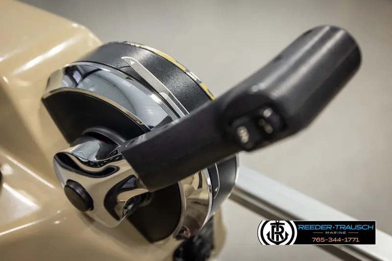 Slide: The Image of Close-up of a 2016 Lowe SS230 boat throttle control handle. - 33