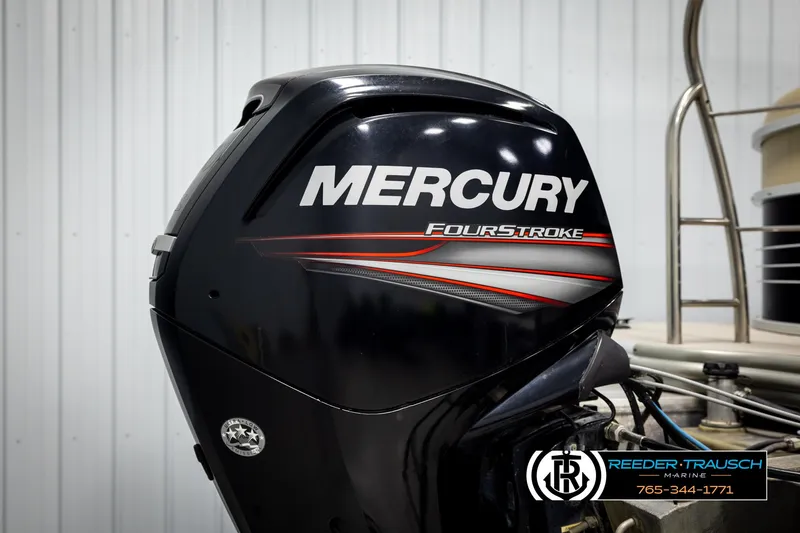 Slide: The Image of Mercury FourStroke engine on a 2016 Lowe SS230 boat, side view. - 39