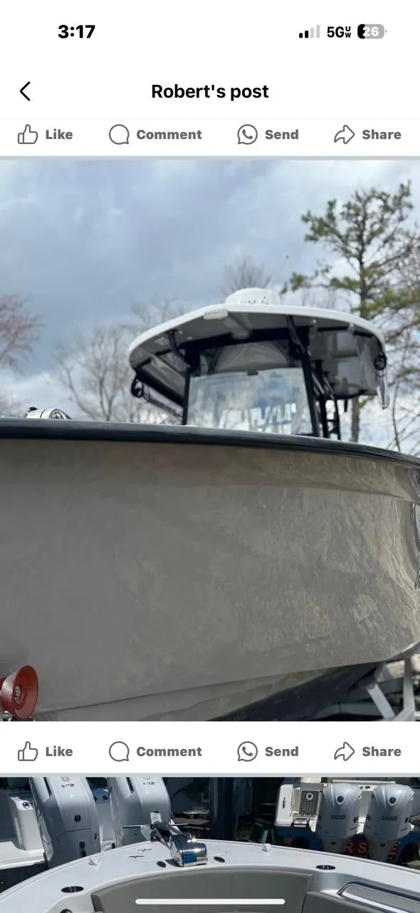 Slide: The Image of 2022 Cape Horn 27 XS boat with spacious seating and dual outboard engines. - 6