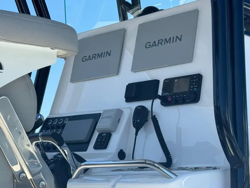 Slide: The Image of 2022 Cape Horn 27 XS boat interior with seating and storage compartments. - 13