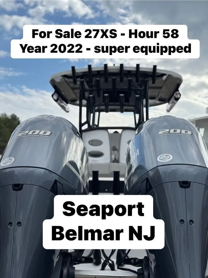 Slide: The Image of 2022 Cape Horn 27 XS boat with Yamaha engines, contact details displayed above. - 2