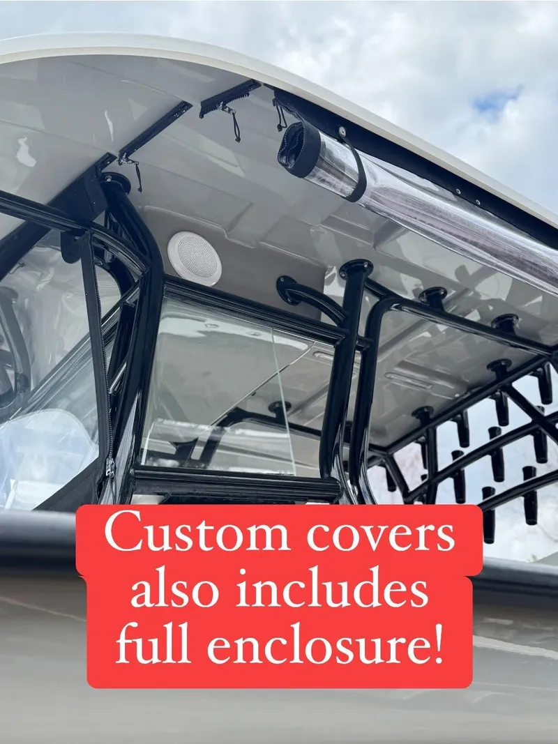 Slide: The Image of 2022 Cape Horn 27 XS boat interior with cushioned seating and sleek design. - 5