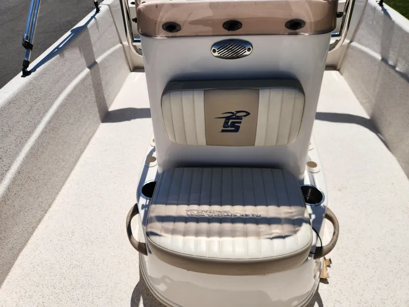 Slide: The Image of 2018 Carolina Skiff 218 DLV boat seat with logo and cup holders. - 9
