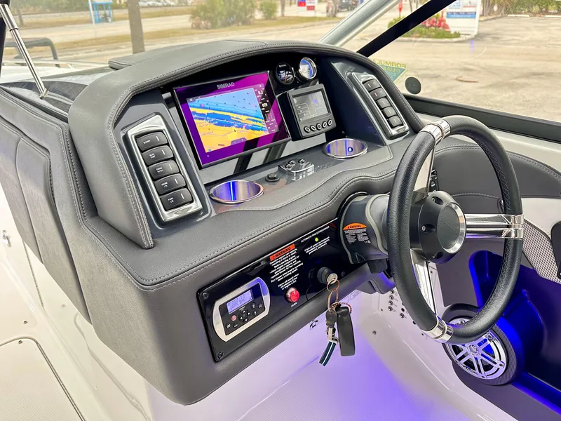 Slide: The Image of Dashboard of a 2021 Formula 270 Bowrider boat with modern navigation system. - 14