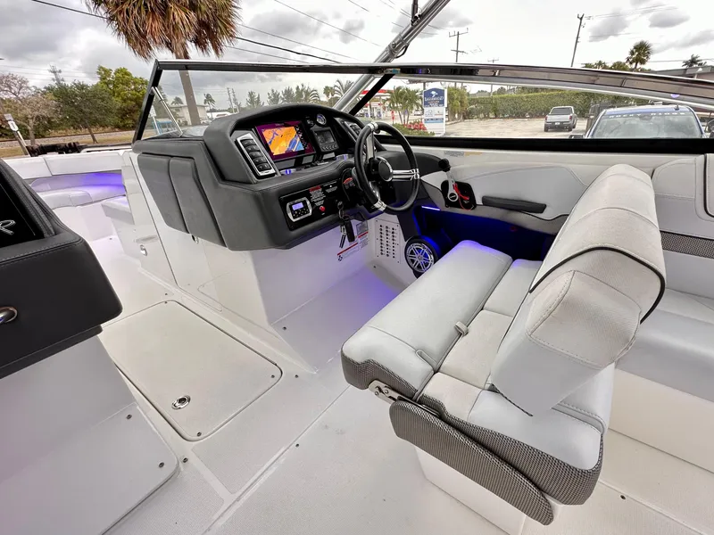 Slide: The Image of 2021 Formula 270 Bowrider cockpit with modern dashboard and seating. - 17