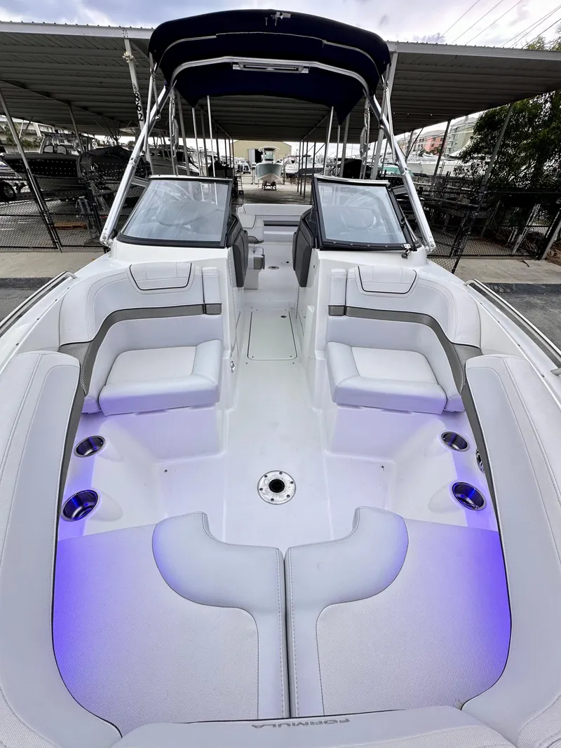 Slide: The Image of 2021 Formula 270 Bowrider boat interior with seating and blue LED lighting. - 9