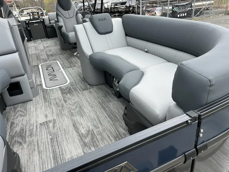 Slide: The Image of 2025 Avalon 2585 Catalina Quad Lounger interior with gray seating and wood-style flooring. - 6