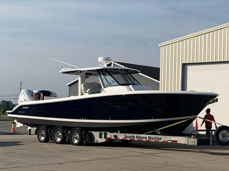 Slide: The Image of 2022 Pursuit S 378 Sport boat on trailer at South Shore Marine. - 21