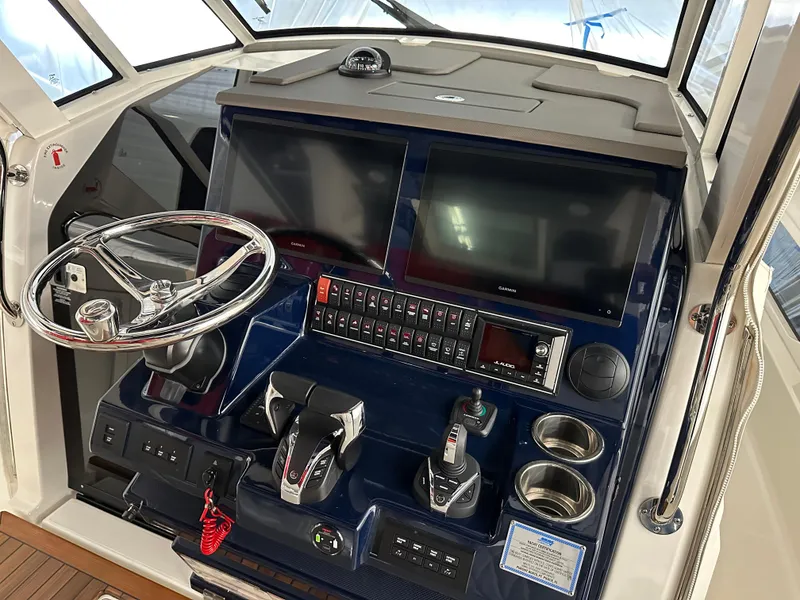 Slide: The Image of (2) Garmin 16" displays.  Joystick. - 22