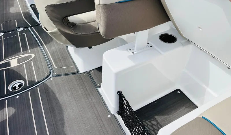 Slide: The Image of 2024 Tahoe 210 S Limited boat interior with seating and storage features. - 37