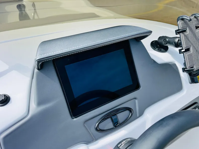 Slide: The Image of 2024 Tahoe 210 S Limited dashboard with touchscreen display and controls. - 42