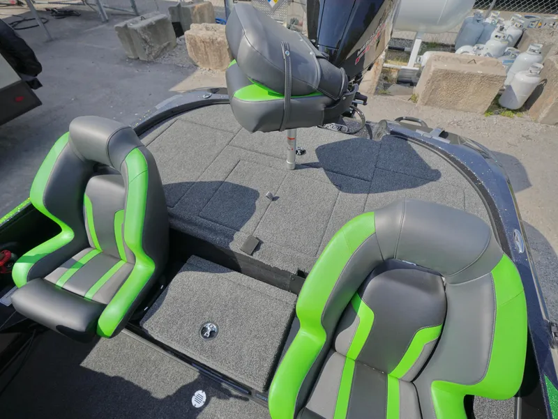 Slide: The Image of 2025 Nitro Z18 boat interior with green and gray seats, showcasing modern design. - 10