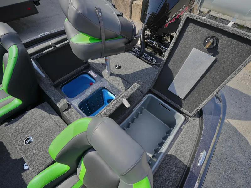 Slide: The Image of 2025 Nitro Z18 boat interior with storage compartments and green-accented seats. - 11
