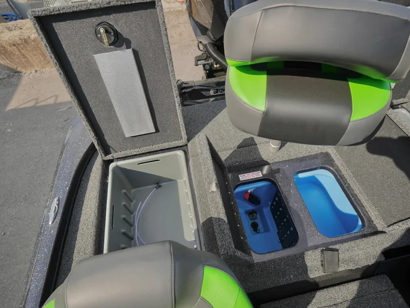 Slide: The Image of 2025 Nitro Z18 boat interior with storage compartments and seating. - 15